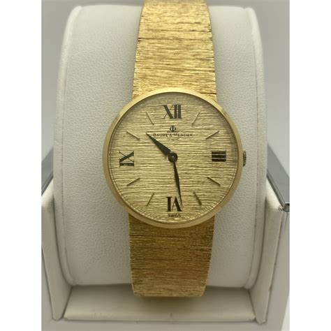 vintage geneve 14k gold watch.